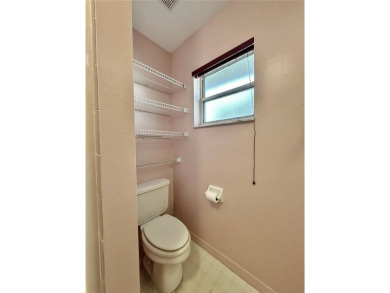 This 3-bedroom, 2-bath block home in Citrus Springs is exactly on Citrus Springs Country Club in Florida - for sale on GolfHomes.com, golf home, golf lot