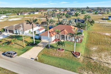 Welcome to your dream home in highly desirable NW Cape Coral! on Burnt Store Golf Club in Florida - for sale on GolfHomes.com, golf home, golf lot