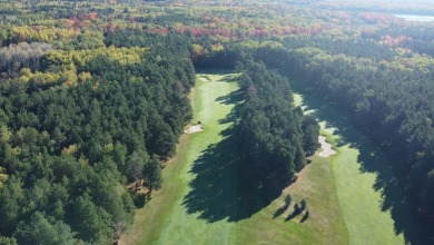 Once in a lifetime opportunity to own property surrounding 3 on Michaywe Pines Course in Michigan - for sale on GolfHomes.com, golf home, golf lot