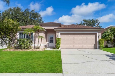Welcome to this beautifully maintained 4-bedroom, 2-bathroom on Royal St. Cloud Golf Links in Florida - for sale on GolfHomes.com, golf home, golf lot