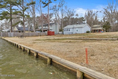 Beautiful prime lakefront property offering breathtaking on Golf Club of Macon in Georgia - for sale on GolfHomes.com, golf home, golf lot