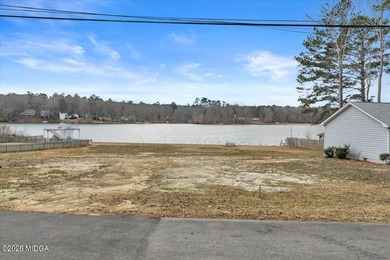 Beautiful prime lakefront property offering breathtaking on Golf Club of Macon in Georgia - for sale on GolfHomes.com, golf home, golf lot