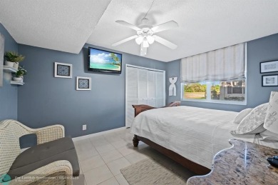 Palm Aire Country Club Golf Home! Remodeled with sophistication on Palm-Aire Country Club and Resort - The Oaks in Florida - for sale on GolfHomes.com, golf home, golf lot