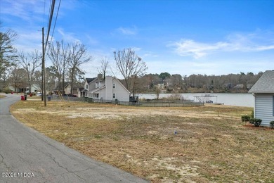 Beautiful prime lakefront property offering breathtaking on Golf Club of Macon in Georgia - for sale on GolfHomes.com, golf home, golf lot