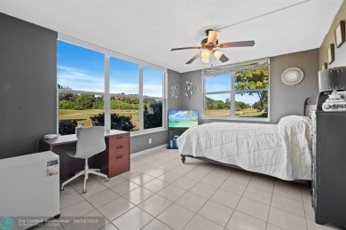 Palm Aire Country Club Golf Home! Remodeled with sophistication on Palm-Aire Country Club and Resort - The Oaks in Florida - for sale on GolfHomes.com, golf home, golf lot