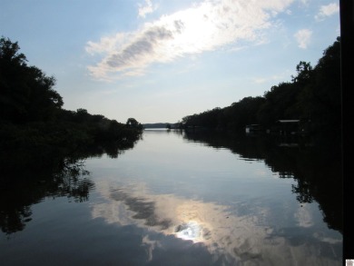 This inviting Lake Barkley Waterfront home with an easy walk to on Boots Randolph Golf Course in Kentucky - for sale on GolfHomes.com, golf home, golf lot