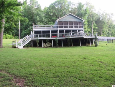 This inviting Lake Barkley Waterfront home with an easy walk to on Boots Randolph Golf Course in Kentucky - for sale on GolfHomes.com, golf home, golf lot