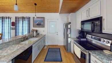 This inviting Lake Barkley Waterfront home with an easy walk to on Boots Randolph Golf Course in Kentucky - for sale on GolfHomes.com, golf home, golf lot