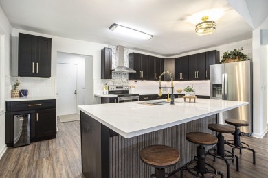 Sprawling, fully renovated walk-out ranch on over an acre with on Pine View Golf Club in Michigan - for sale on GolfHomes.com, golf home, golf lot
