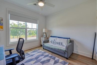 Welcome to this stunning, 4 bedroom/3 bathroom low-maintenance on Woodfin Ridge Golf Club in South Carolina - for sale on GolfHomes.com, golf home, golf lot