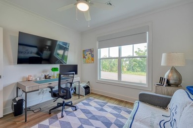 Welcome to this stunning, 4 bedroom/3 bathroom low-maintenance on Woodfin Ridge Golf Club in South Carolina - for sale on GolfHomes.com, golf home, golf lot