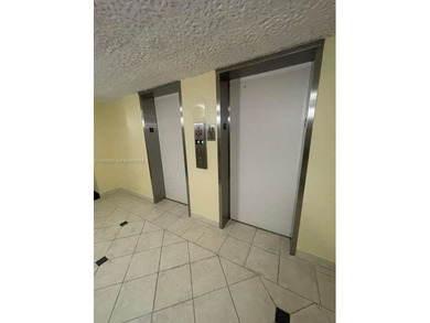 AMAZING *AS-IS* 2/2 corner unit Condo that sits on the beautiful on Coral Ridge Country Club in Florida - for sale on GolfHomes.com, golf home, golf lot