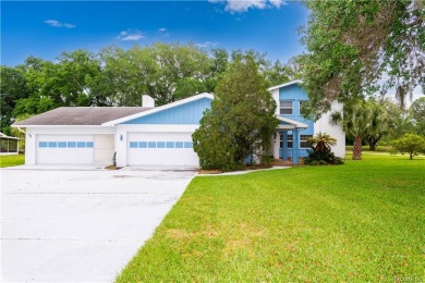 Welcome home, this beautiful 1975 two story three bedroom two on Cypresswood Golf and Country Club in Florida - for sale on GolfHomes.com, golf home, golf lot