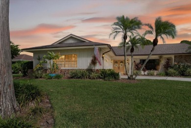 Welcome to this inviting 4-bedroom, 2-bathroom home located in on East Lake Woodlands Country Club in Florida - for sale on GolfHomes.com, golf home, golf lot