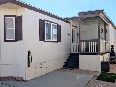Welcome home to this amazing, rare 16-foot-wide park model with on Riverview Golf Course in Arizona - for sale on GolfHomes.com, golf home, golf lot