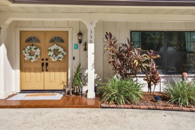 Welcome to this inviting 4-bedroom, 2-bathroom home located in on East Lake Woodlands Country Club in Florida - for sale on GolfHomes.com, golf home, golf lot