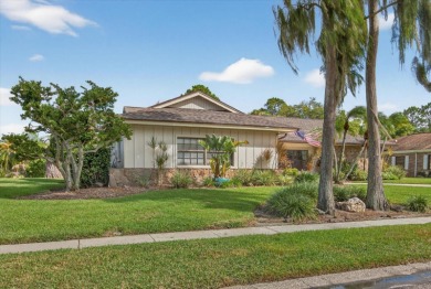 Welcome to this inviting 4-bedroom, 2-bathroom home located in on East Lake Woodlands Country Club in Florida - for sale on GolfHomes.com, golf home, golf lot