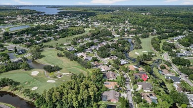 Welcome to this inviting 4-bedroom, 2-bathroom home located in on East Lake Woodlands Country Club in Florida - for sale on GolfHomes.com, golf home, golf lot