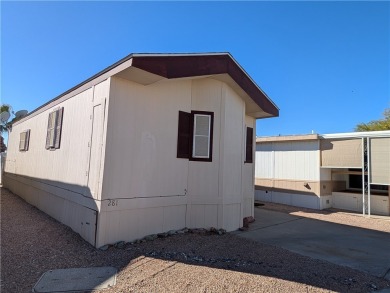 Welcome home to this amazing, rare 16-foot-wide park model with on Riverview Golf Course in Arizona - for sale on GolfHomes.com, golf home, golf lot
