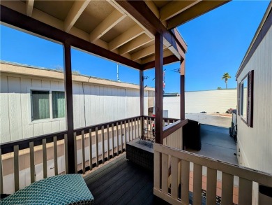 Welcome home to this amazing, rare 16-foot-wide park model with on Riverview Golf Course in Arizona - for sale on GolfHomes.com, golf home, golf lot
