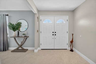 Welcome to this inviting 4-bedroom, 2-bathroom home located in on East Lake Woodlands Country Club in Florida - for sale on GolfHomes.com, golf home, golf lot