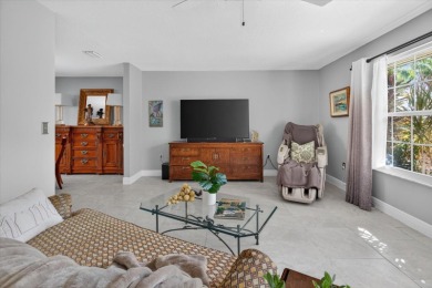 Welcome to this inviting 4-bedroom, 2-bathroom home located in on East Lake Woodlands Country Club in Florida - for sale on GolfHomes.com, golf home, golf lot