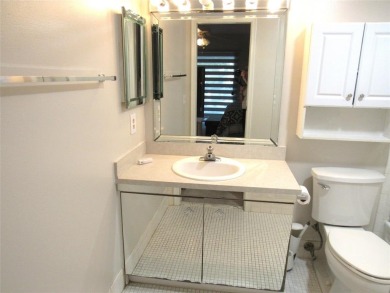 TURNKEY 1 BEDROOM, 1.5 BATHS. TILE IN LIVING AREAS, CARPET IN on Wynmoor Golf Course in Florida - for sale on GolfHomes.com, golf home, golf lot