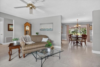 Welcome to this inviting 4-bedroom, 2-bathroom home located in on East Lake Woodlands Country Club in Florida - for sale on GolfHomes.com, golf home, golf lot