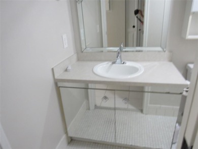 TURNKEY 1 BEDROOM, 1.5 BATHS. TILE IN LIVING AREAS, CARPET IN on Wynmoor Golf Course in Florida - for sale on GolfHomes.com, golf home, golf lot