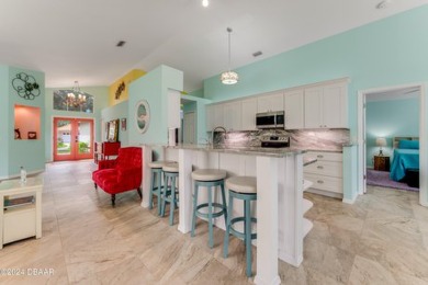 Make this beautifully updated home your new address in gated on Plantation Bay Golf and Country Club in Florida - for sale on GolfHomes.com, golf home, golf lot