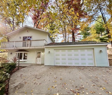 LEWISTON - This charming colonial style home offers the right on Garland Resort and Golf Club  in Michigan - for sale on GolfHomes.com, golf home, golf lot