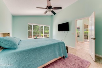 Make this beautifully updated home your new address in gated on Plantation Bay Golf and Country Club in Florida - for sale on GolfHomes.com, golf home, golf lot