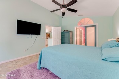 Make this beautifully updated home your new address in gated on Plantation Bay Golf and Country Club in Florida - for sale on GolfHomes.com, golf home, golf lot
