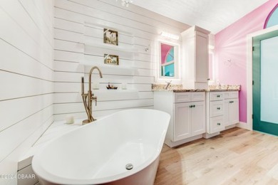 Make this beautifully updated home your new address in gated on Plantation Bay Golf and Country Club in Florida - for sale on GolfHomes.com, golf home, golf lot