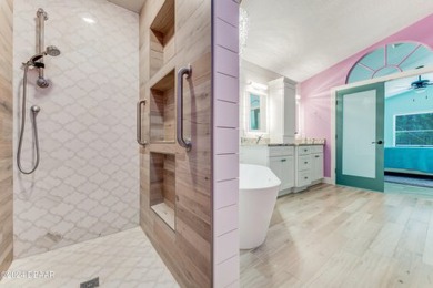 Make this beautifully updated home your new address in gated on Plantation Bay Golf and Country Club in Florida - for sale on GolfHomes.com, golf home, golf lot