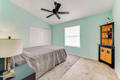 Make this beautifully updated home your new address in gated on Plantation Bay Golf and Country Club in Florida - for sale on GolfHomes.com, golf home, golf lot