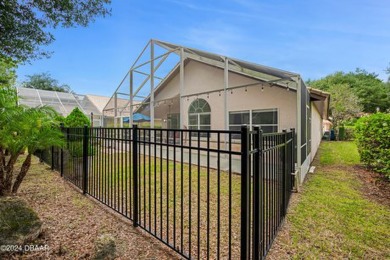 Make this beautifully updated home your new address in gated on Plantation Bay Golf and Country Club in Florida - for sale on GolfHomes.com, golf home, golf lot