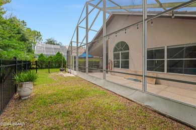 Make this beautifully updated home your new address in gated on Plantation Bay Golf and Country Club in Florida - for sale on GolfHomes.com, golf home, golf lot