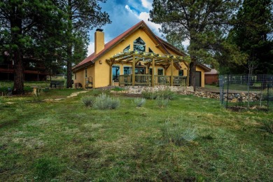 Charming Southwest-Style Retreat Near Angel Fire Resort  This on Angel Fire Resort Country Club in New Mexico - for sale on GolfHomes.com, golf home, golf lot