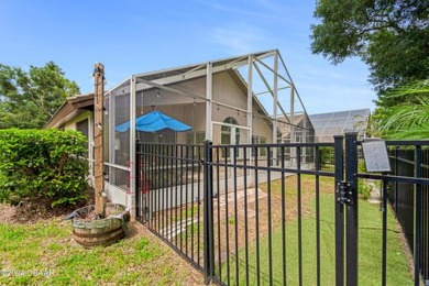 Make this beautifully updated home your new address in gated on Plantation Bay Golf and Country Club in Florida - for sale on GolfHomes.com, golf home, golf lot
