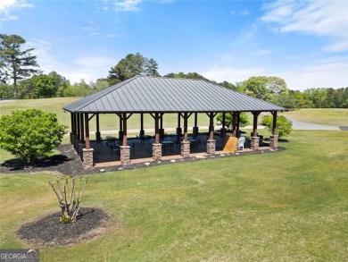 Discover the perfect blend of comfort, space, and leisure in on Fairfield Plantation Golf and Country Club in Georgia - for sale on GolfHomes.com, golf home, golf lot