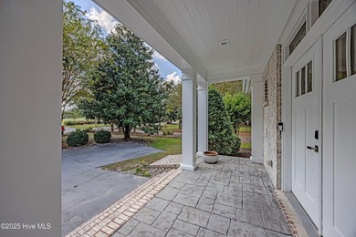 Upscale living with long golf views of Hole #3 of the on River Landing Golf Course in North Carolina - for sale on GolfHomes.com, golf home, golf lot