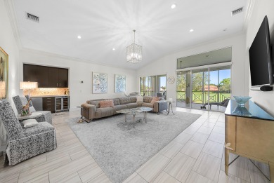 Experience timeless elegance and effortless living in this on BallenIsles Golf and Country Club in Florida - for sale on GolfHomes.com, golf home, golf lot