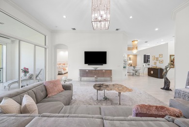 Experience timeless elegance and effortless living in this on BallenIsles Golf and Country Club in Florida - for sale on GolfHomes.com, golf home, golf lot