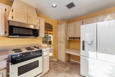 Indulge in refined resort-style living within the prestigious on Saddlebrooke Golf Course in Arizona - for sale on GolfHomes.com, golf home, golf lot