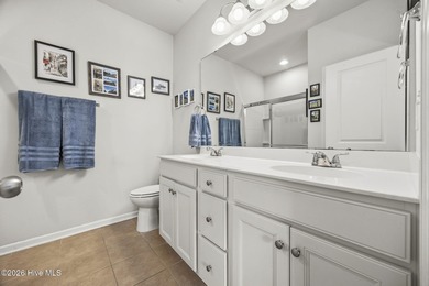 Welcome to 301 Bulkhead Bend, a bright and spacious end-unit in on Carolina Shores Golf Course in North Carolina - for sale on GolfHomes.com, golf home, golf lot