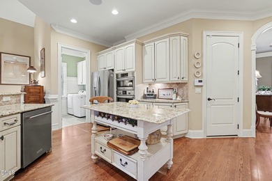 Situated on a beautifully landscaped corner lot in the on Governors Club in North Carolina - for sale on GolfHomes.com, golf home, golf lot