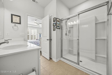 Welcome to 301 Bulkhead Bend, a bright and spacious end-unit in on Carolina Shores Golf Course in North Carolina - for sale on GolfHomes.com, golf home, golf lot