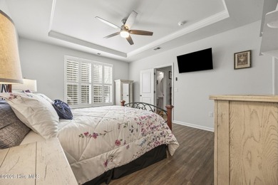 Welcome to 301 Bulkhead Bend, a bright and spacious end-unit in on Carolina Shores Golf Course in North Carolina - for sale on GolfHomes.com, golf home, golf lot