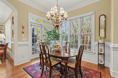 Situated on a beautifully landscaped corner lot in the on Governors Club in North Carolina - for sale on GolfHomes.com, golf home, golf lot